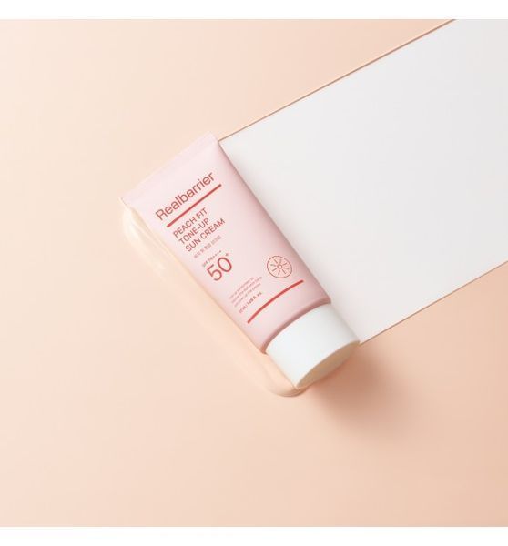 Крем сонцезахисний з персиковим підтоном Real Barrier Peach Fit Tone-Up Sun Cream M239108 фото